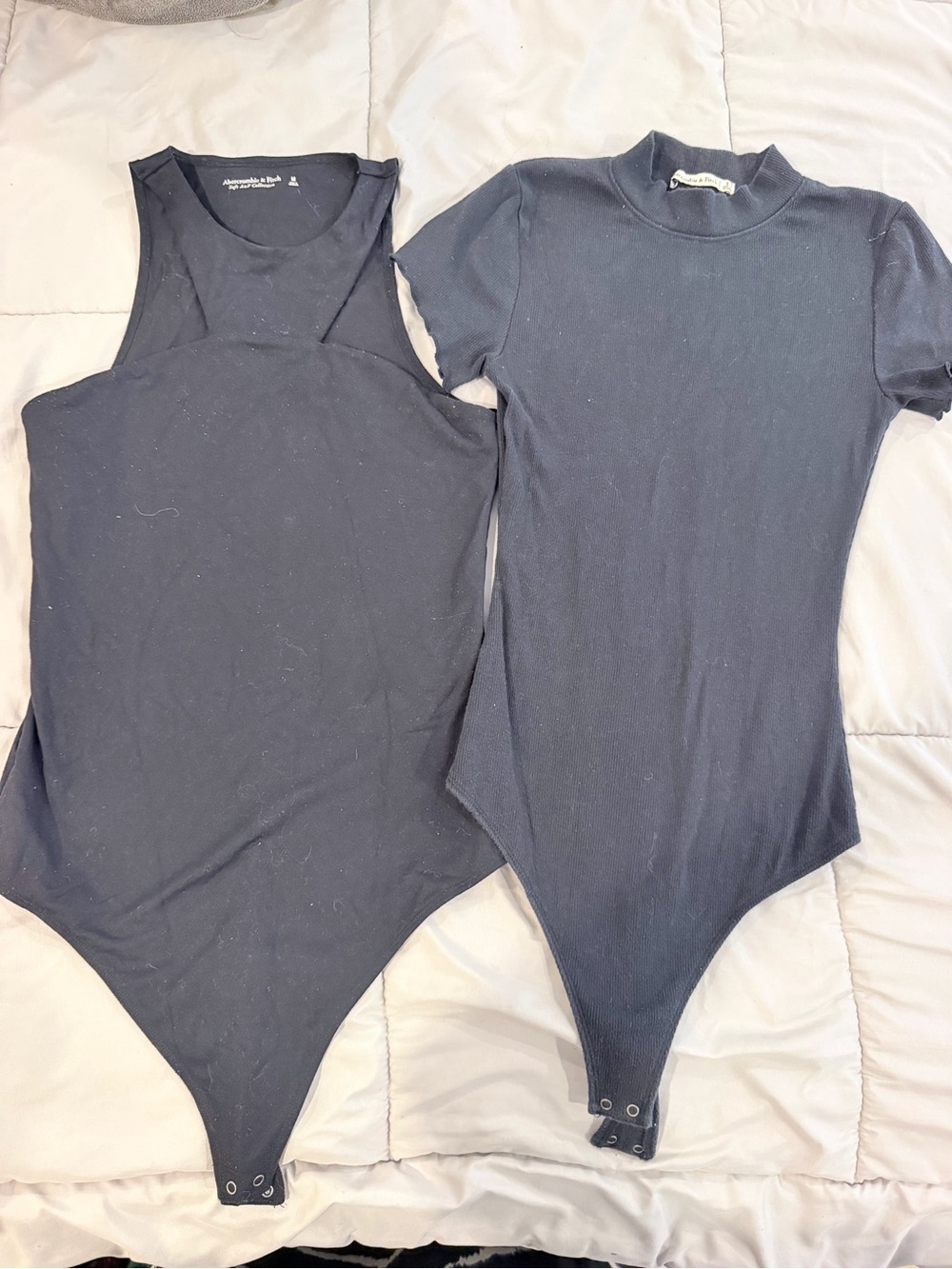 (2) A&F Black Ribbed Short-Sleeve and Sleeveless Bodysuit bundle